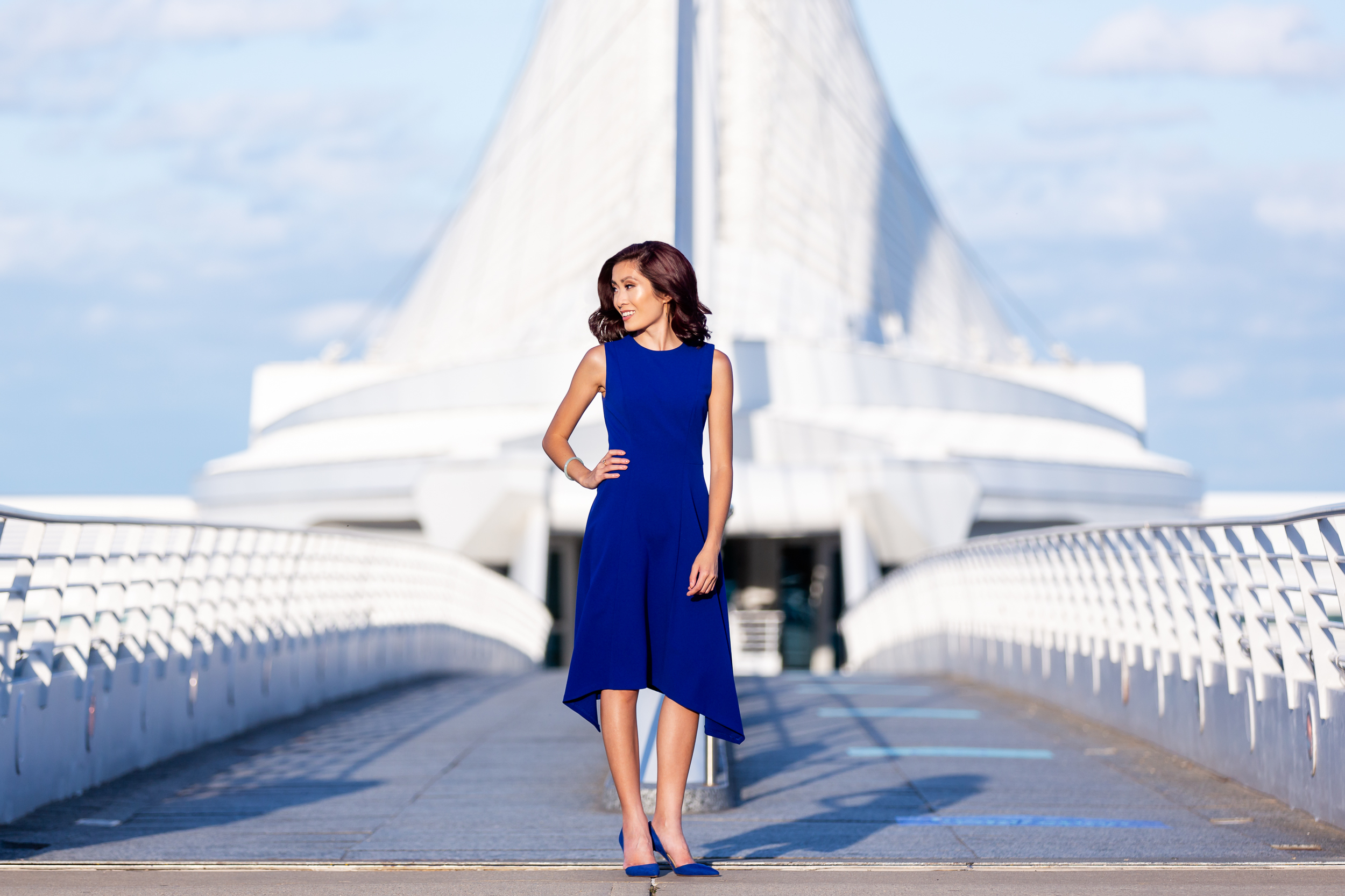 Brand Portrait of Pauleen Le Standing in front of the Calatrava, Milwaukee Art Museum